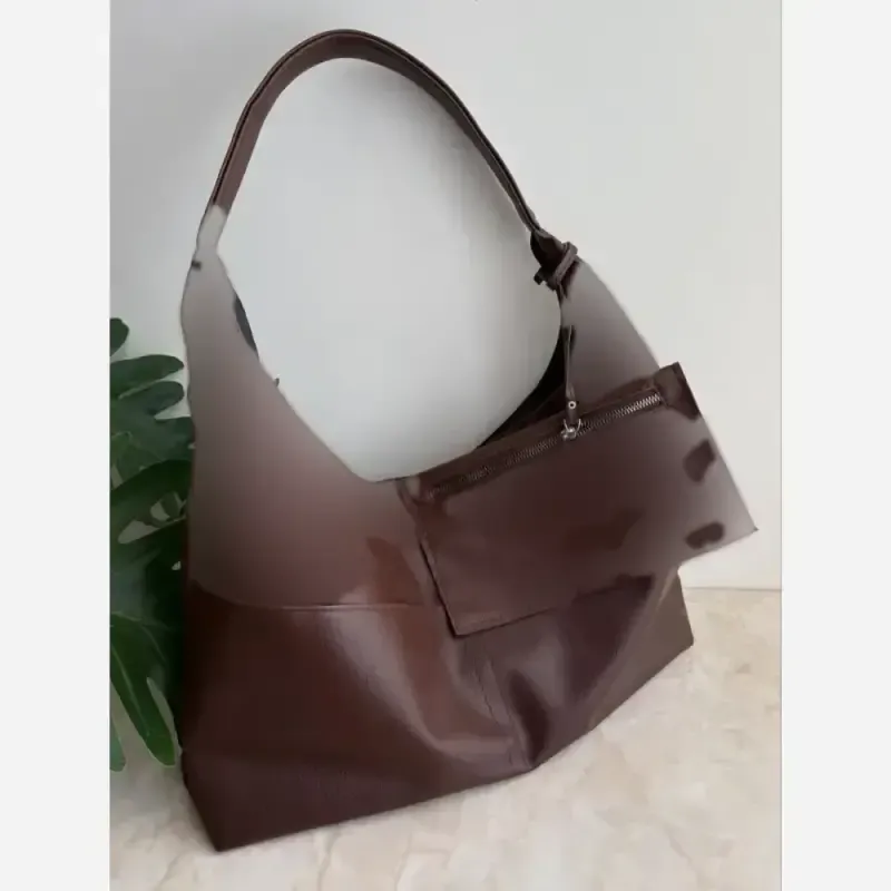 کیف زنانه شل شرانگ وارداتی طرح دو جیب جلو مشکی شکلاتی